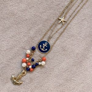 Long gold anchor necklace with pearls and starfish